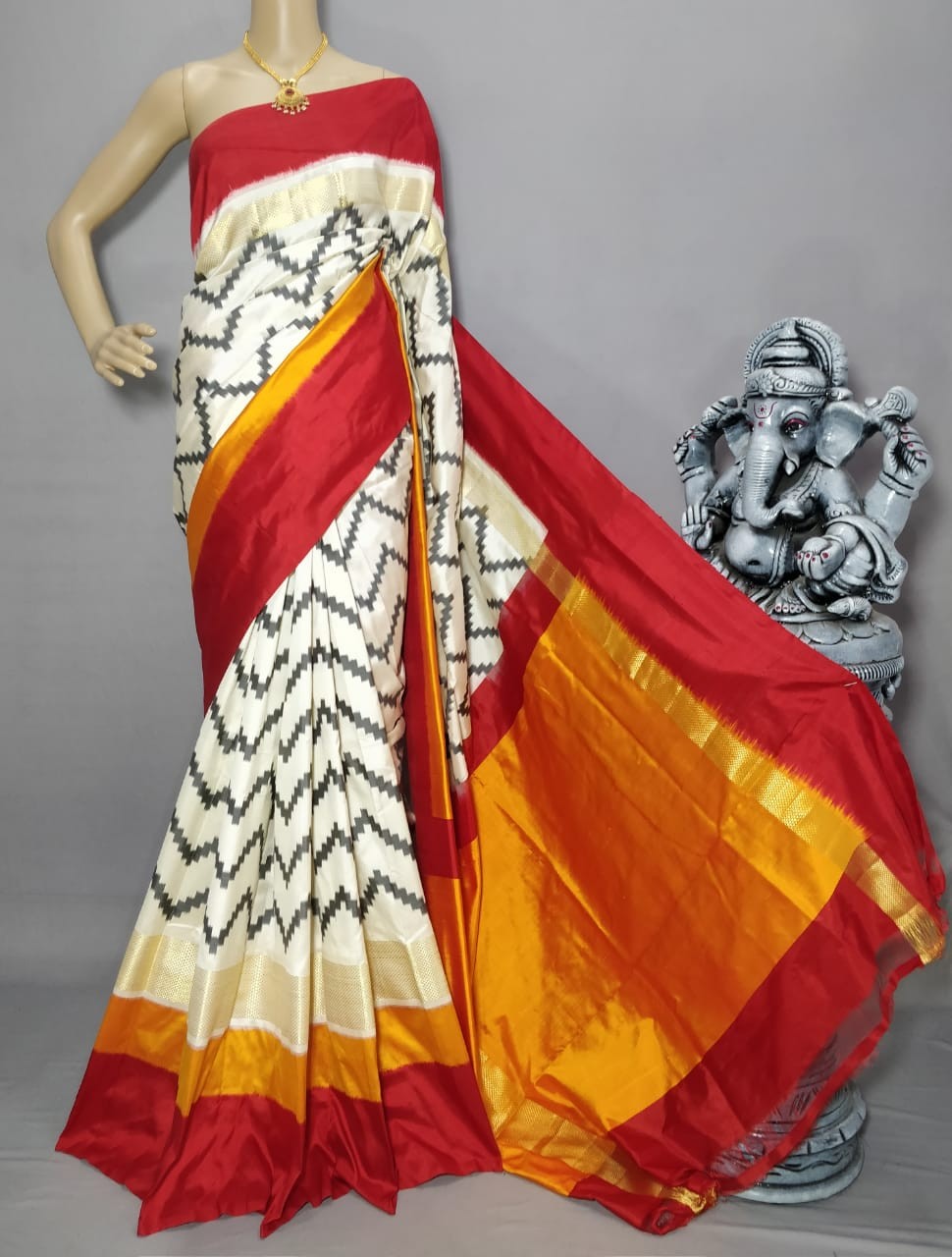 Pochampally Ikkat Silk Cream With Red Color Saree