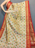 Ikkat Tissue Cream With Red Color Sari