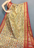 Ikkat Tissue Cream With Red Color Saree