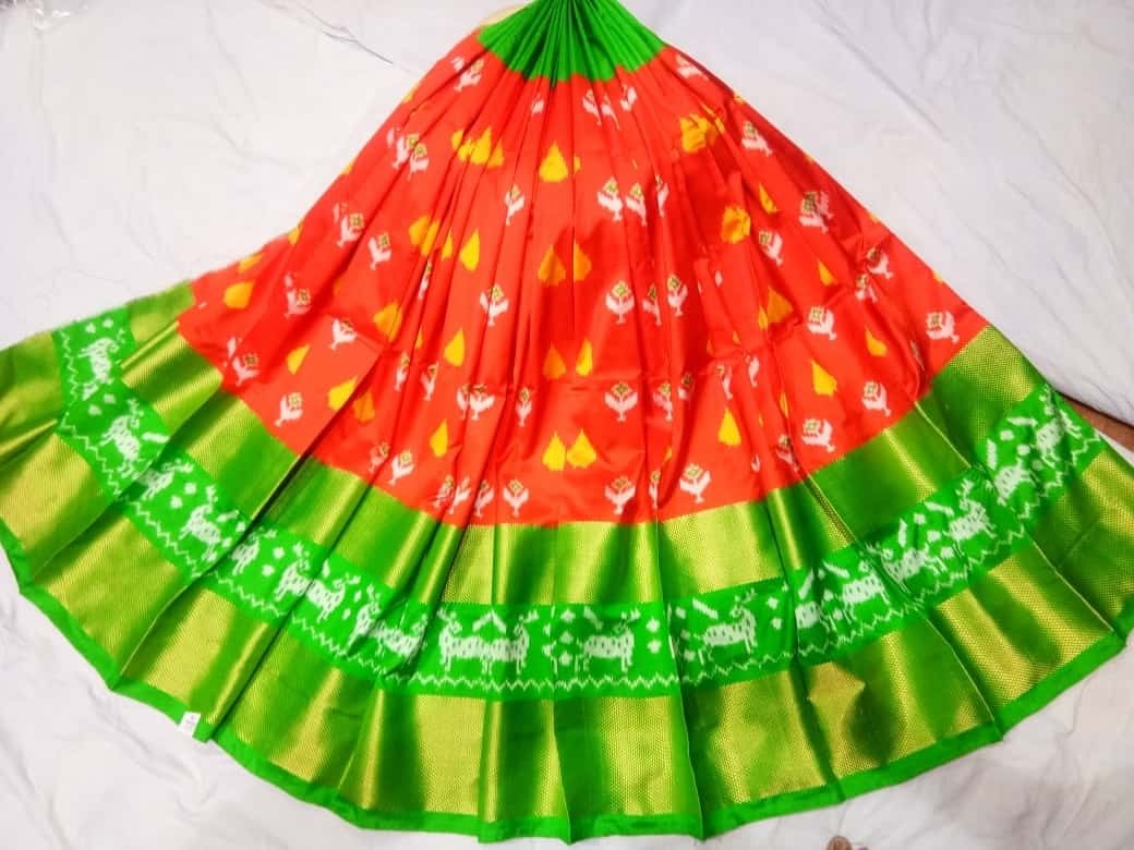 Ikkaat Silk Oarnge With Parrot green Color Lehenga